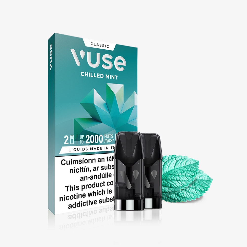 The Chilled Mint Vuse Classic Flavour Pods box from VUSE features two pre-filled pods and imagery of fresh mint leaves. The packaging displays product information and a health warning in black text at the bottom, highlighting the smooth nic salts formula in each Chilled Mint Vuse pod.