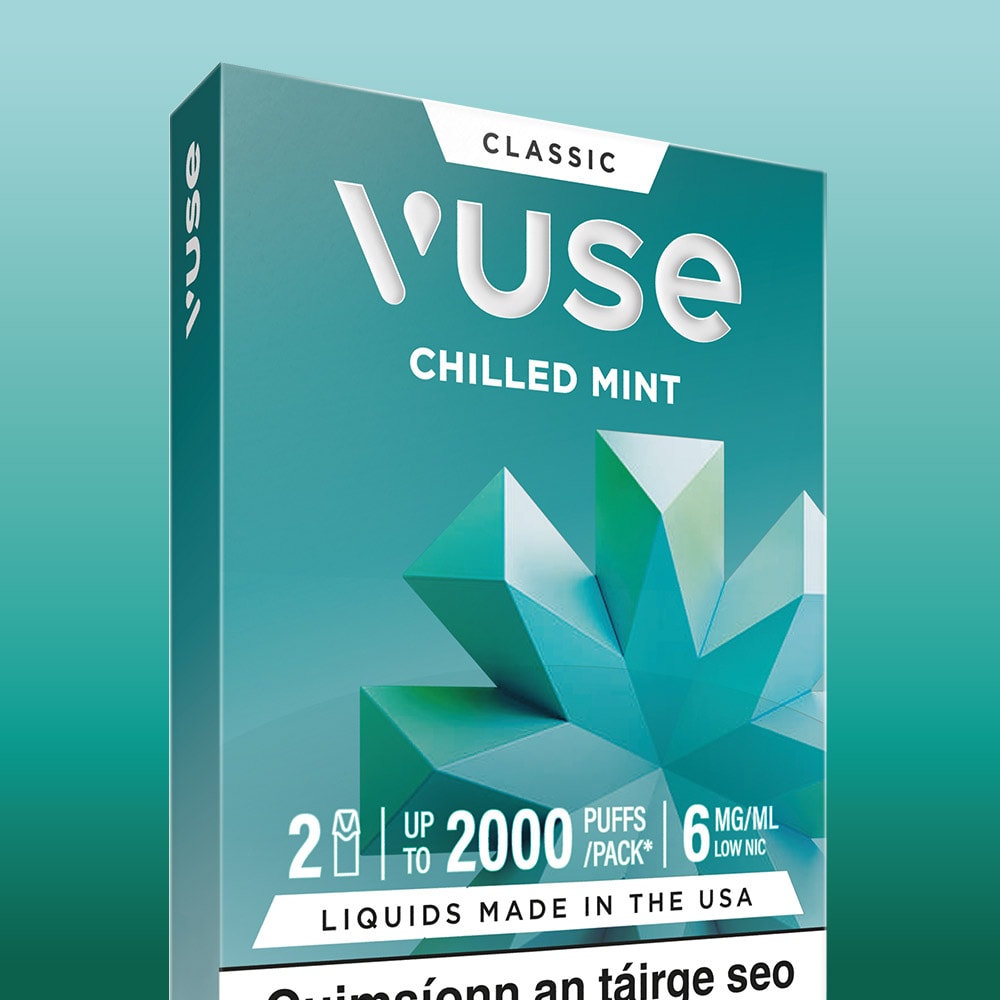 A box of VUSE Chilled Mint Vuse Classic Flavour Pods, decorated with geometric mint leaf artwork. These pre-filled e-liquid pods use nic salts for a smooth vaping experience and offer up to 2000 puffs per pack with 6mg/mL nicotine content, featuring text in both English and Irish.