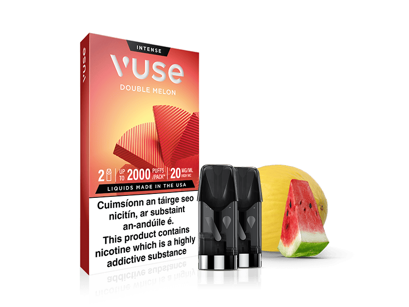 Vuse Ireland A Vuse Double Melon Extra Intense vape pod pack from VUSE, containing two pre-filled e-liquid pods, is shown alongside a watermelon slice and a melon half. The packaging displays a nicotine warning in both English and Irish, emphasizing the use of nic salts for smooth satisfaction.