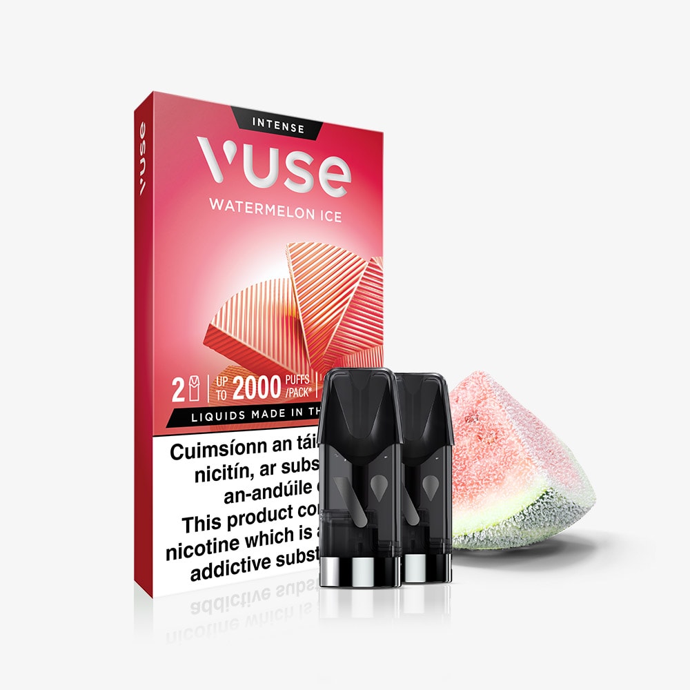 VUSE Pod Watermelon Ice Extra Intense vape pod pack featuring two pre-filled e-liquid pods displayed in front, accompanied by a fresh watermelon slice beside the pack and product warnings at the base of the packaging. Experience an invigorating burst of flavor with VUSE Pod Watermelon Ice Extra Intense, crafted for seamless use with Vuse PRO pod devices.