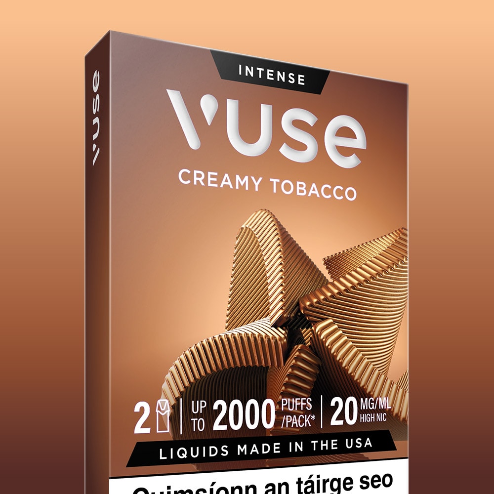 A VUSE Pod Creamy Tobacco Extra Intense package, displaying geometric wood designs on a brown background, includes text that indicates 2 devices per pack, up to 2000 puffs, 20 mg/mL nicotine strength, and “Liquids made in the USA.” The pack showcases pre-filled Creamy Tobacco pods from VUSE for a seamless vaping experience.