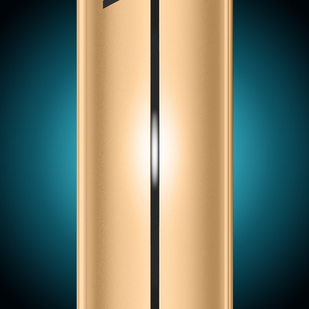Here’s a rewritten version using your product data: A close-up of the gold-colored Vuse Pro Device Kit by VUSE, featuring a reflective surface and a slim black line running down the center, set against a blue gradient background.
