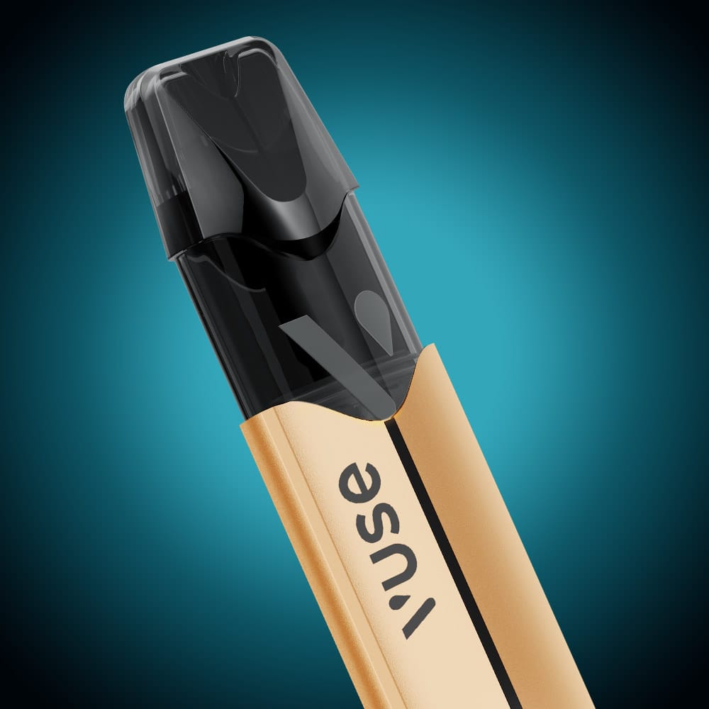 Vuse Ireland A close-up of a sleek, gold and black Vuse Pro Device Kit by VUSE is shown against a blue gradient background. The stylish vape features fast charging capabilities for convenience on the go.