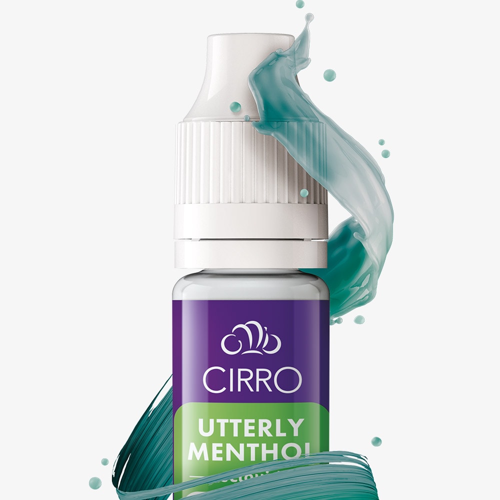 A small bottle labeled CIRRO Cirro eLiquid Bottle Crisp Mint with a white cap is displayed. Teal and green liquid swirls artistically around the bottle against a plain white background, capturing the refreshing essence of Crisp Mint—a 50:50 e-liquid blend by CIRRO, perfect for fans of mint flavour vape juice.
