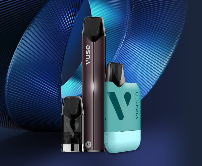 Three Vuse vape devices in black, silver, and teal stand upright against a dark blue background with abstract, curved, metallic blue shapes.