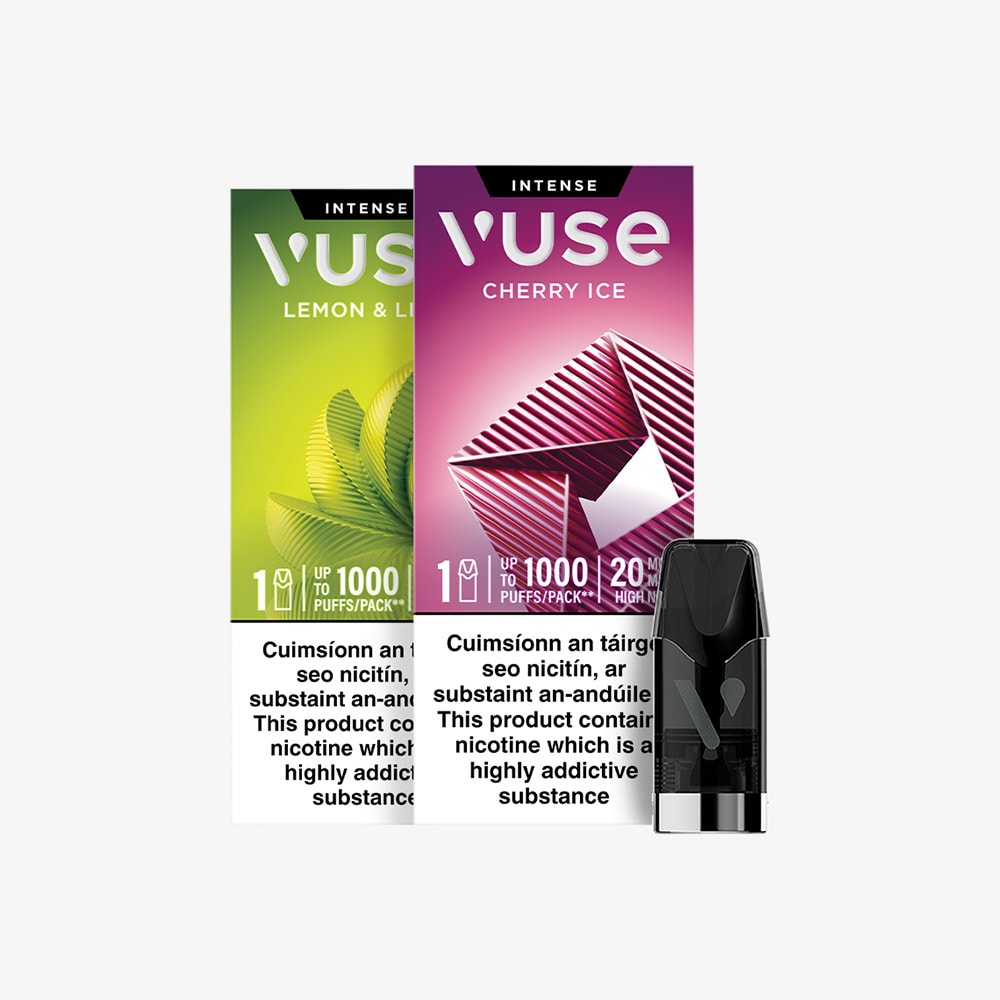 Vuse Ireland Two Vuse vape pod packages, one green for Lemon & Lime and one purple for Cherry Ice, are shown with a single black vape pod in front of the packages on a white background.