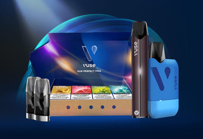 A Vuse vape starter kit displayed on a blue background, featuring an open box with colorful vape pods, two Vuse devices—one black and one blue—and two additional vape pods in the foreground.