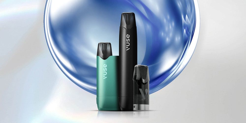 Vuse Ireland Three sleek vape devices—two larger in black and green, and one smaller in black—stand upright in front of a shiny blue and silver abstract background. All devices are labeled Vuse.